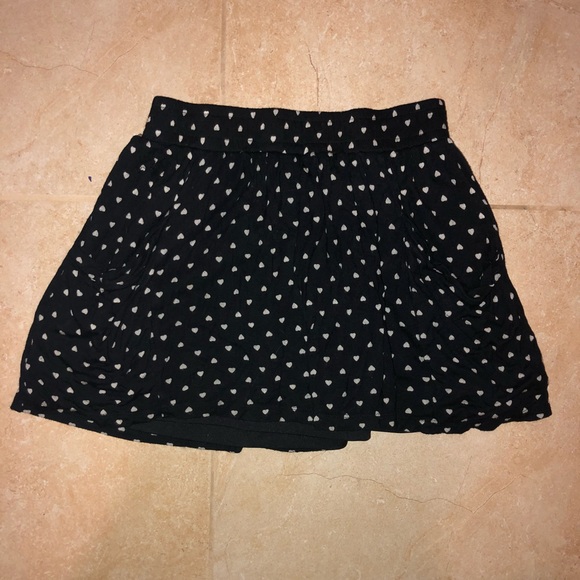 Forever 21 Dresses & Skirts - Mini black skirt with silver hearts